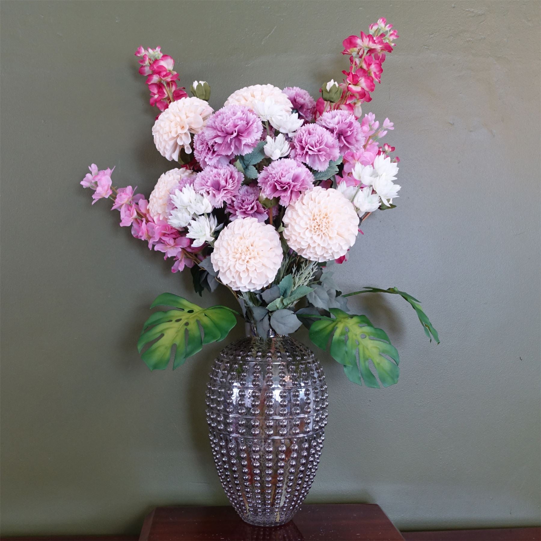 75cm Mixed Artificial Flower Arrangement with Smoke Grey Bubble Vase, Dahlia, Carnation, Delphinium, Monstera and Starflower