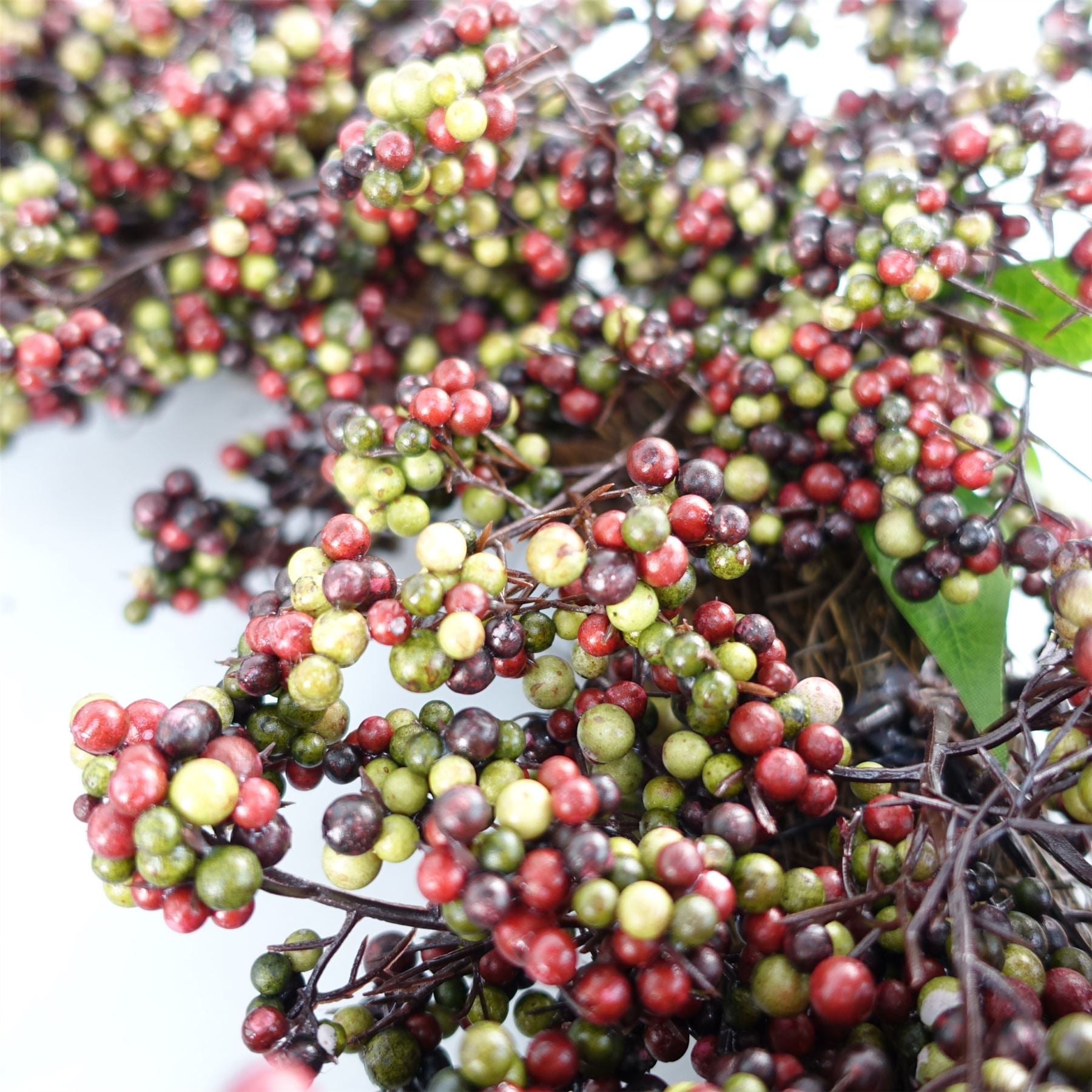 55cm Artificial Hanging Black and Red Berry Wreath